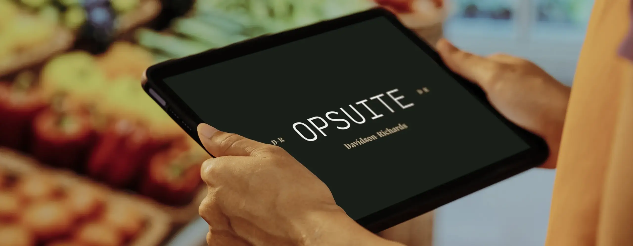 OpSuite EPOS till system on a handheld tablet in a retail store
